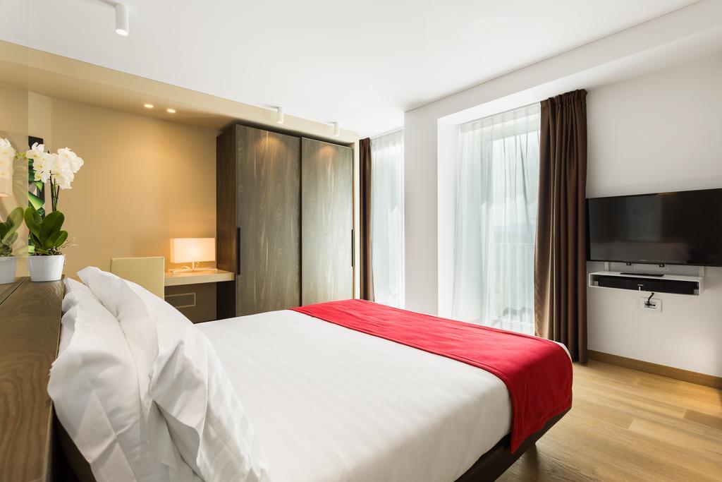 Suites Hotel Astor Belluno Quarto foto
