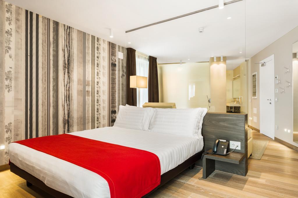 Suites Hotel Astor Belluno Quarto foto